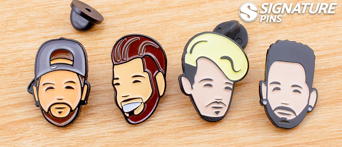 Soft enamel pins with black metal plating in custom shapes
