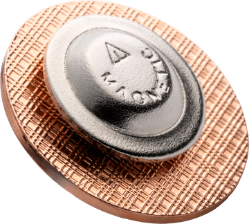 Magnetic backing on a lapel pin