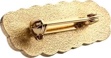 Safety pin backing on a lapel pin