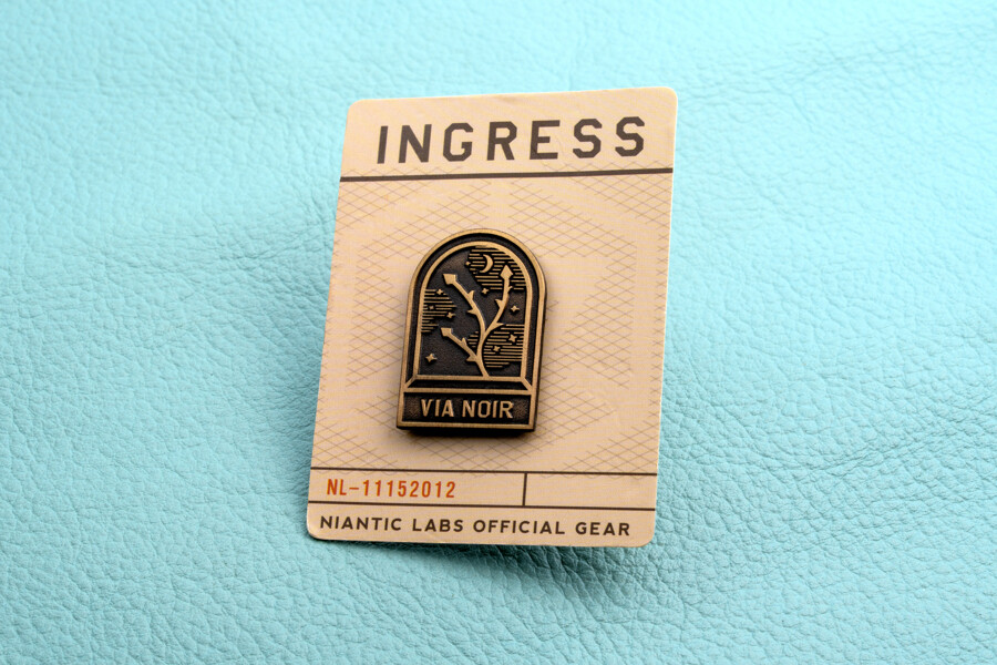 Lapel pin on a custom printed backer card