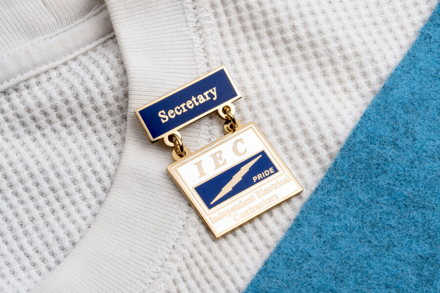 Lapel pin with a dangler charm